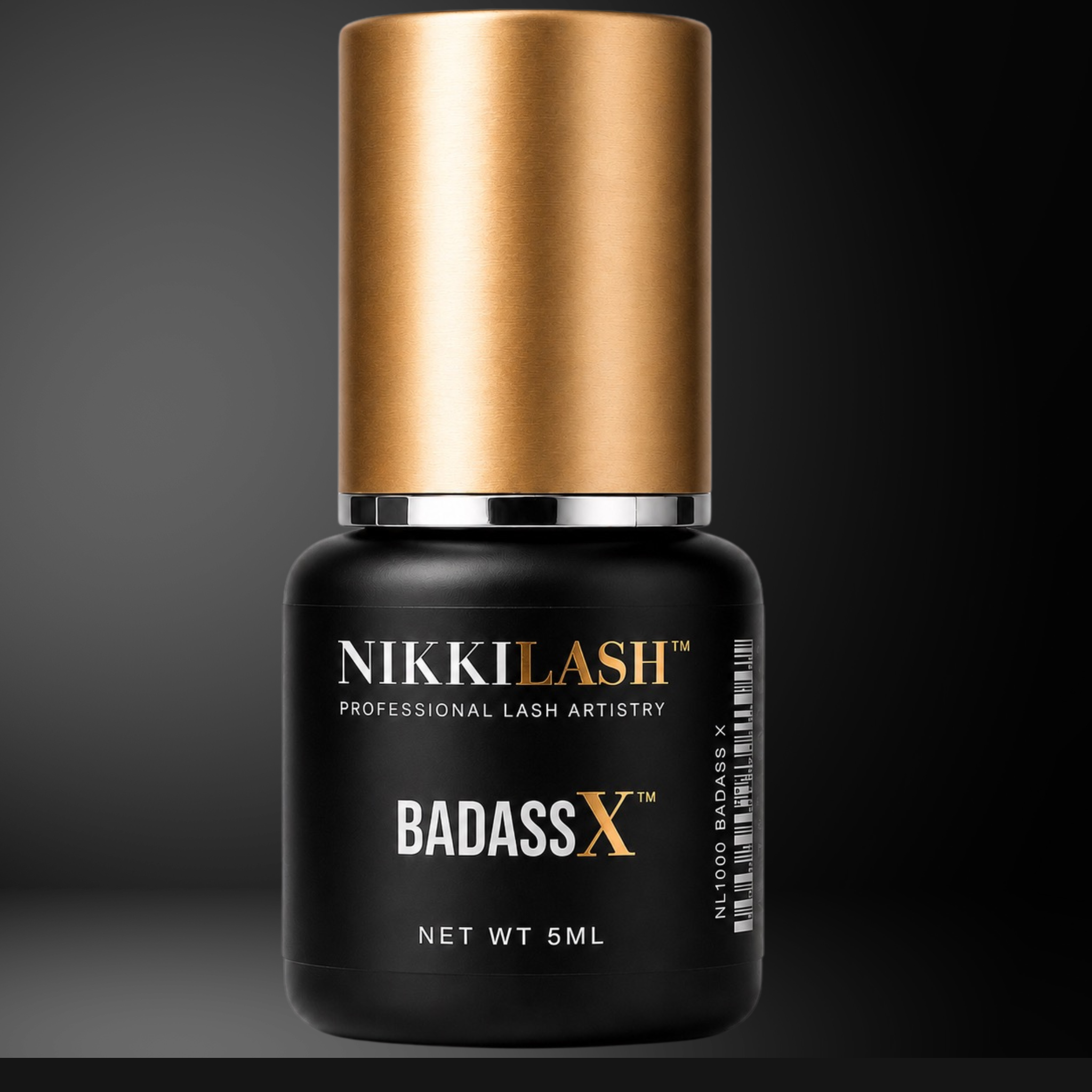 NIKKILASH BADASS X professional lash adhesive 5ML on a dark premium background.
